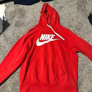 Men’s red Nike hoodie.